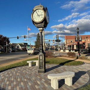 pictured is Walpole's 300th anniversary clock, surrounded by bricks and cement benches.