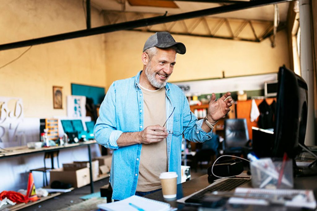 Trades worker in his garage.