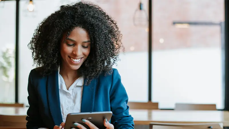 Woman with ipad in office
